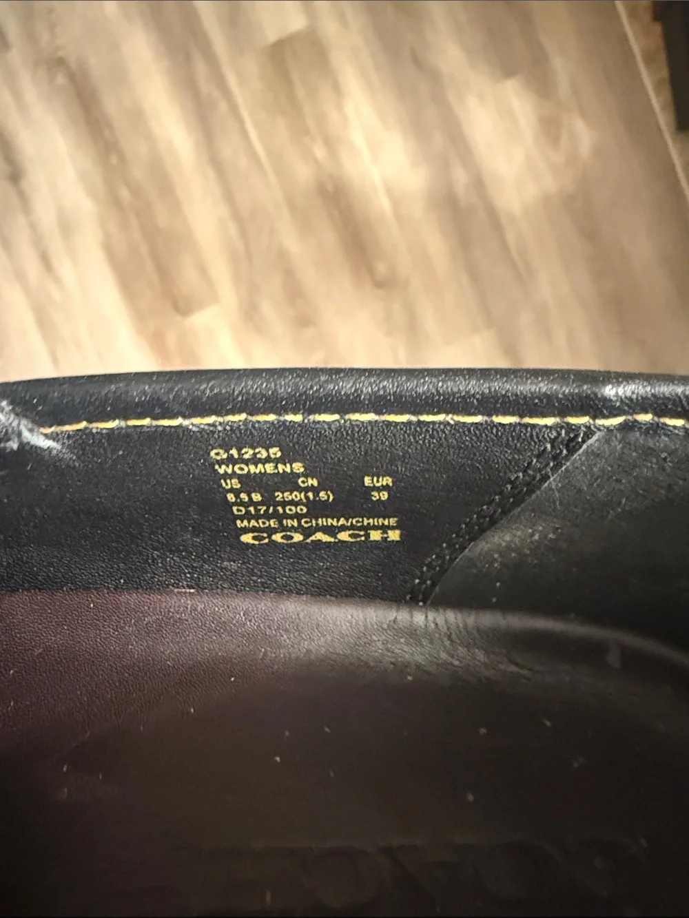 Coach Black Leather Slip-On Loafers with Floral Appliqués